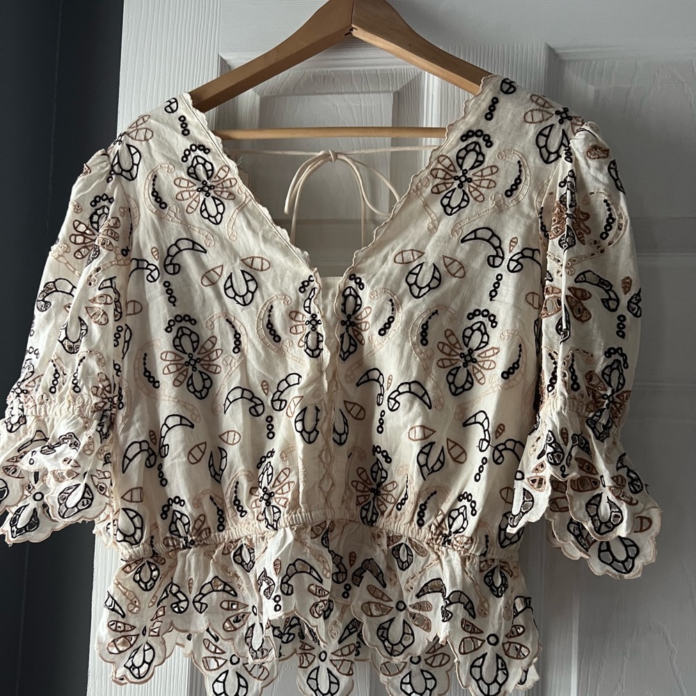 Beautiful cotton embroidered top by Anthropologie